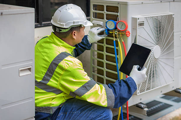 Professional Heat Pump Repair technician working in Hebron, IN